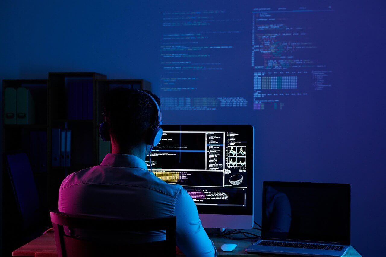A man working with Coding
